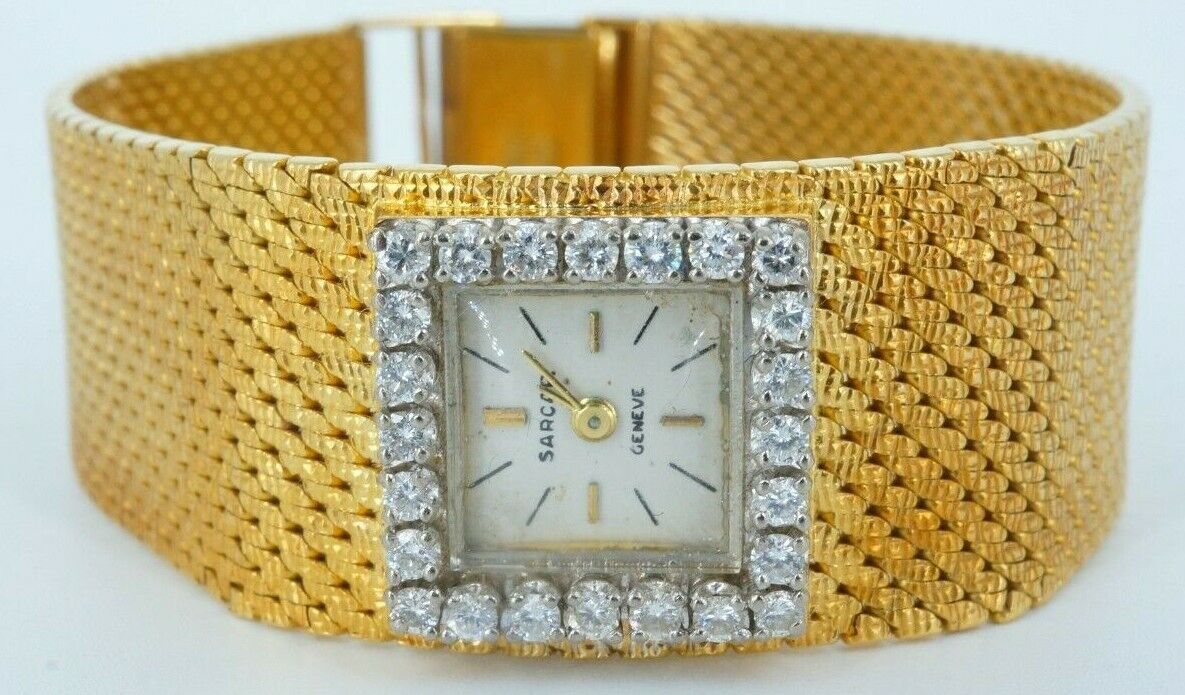 Sold at Auction: An 18ct gold Sarcar gents wrist watch, the rounded